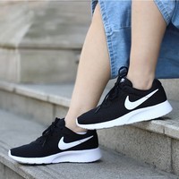 耐克（NIKE） 女鞋2023春季新款运动鞋TANJUN轻便透气训练鞋跑步鞋812655-011 黑色812655-011 36