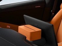 小米YU7磁吸纸巾盒:车规级设计引热议