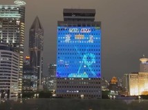 上海电信大楼化身130米巨型互动游戏屏,光影节上演沉浸式城市艺术