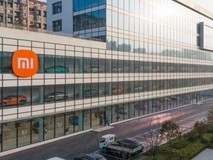 杭州最大小米汽车旗舰店亮相:玻璃城堡式SU7展厅成网红打卡地