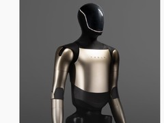 特斯拉AI微博首秀：人形机器人优雅打包爆米花