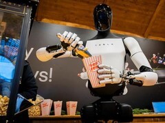 特斯拉Optimus机器人首秀爆米花售卖，迈向商用新阶段