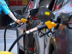 2026年10月15日24时油价下调窗口开启，92号汽油每升降0.18元